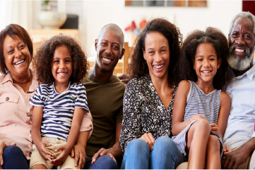 family sitting together on a couch