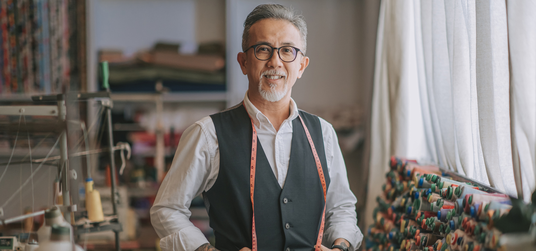 A male tailor in his studio