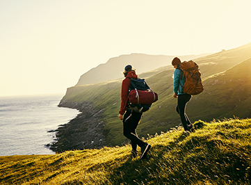Couple hiking by the water
