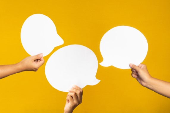 speech bubbles on orange background